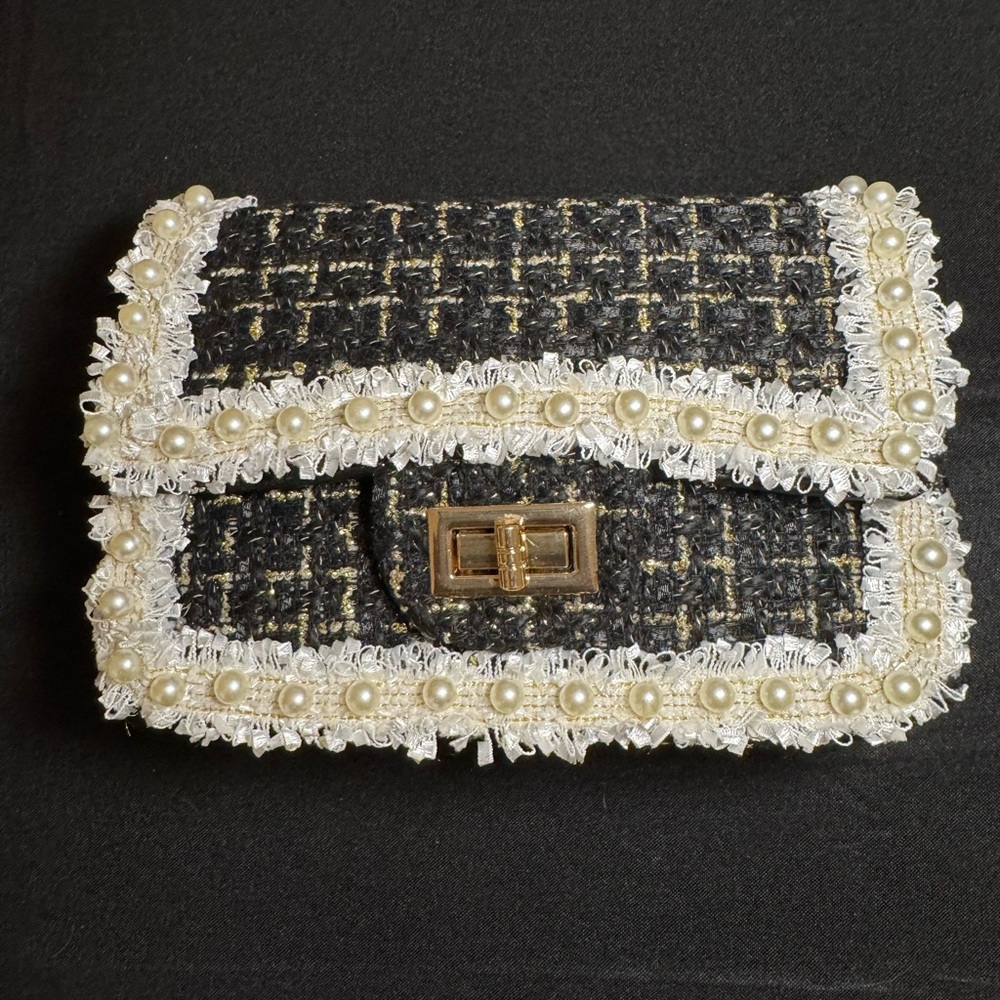 Black with pearl trimmimg